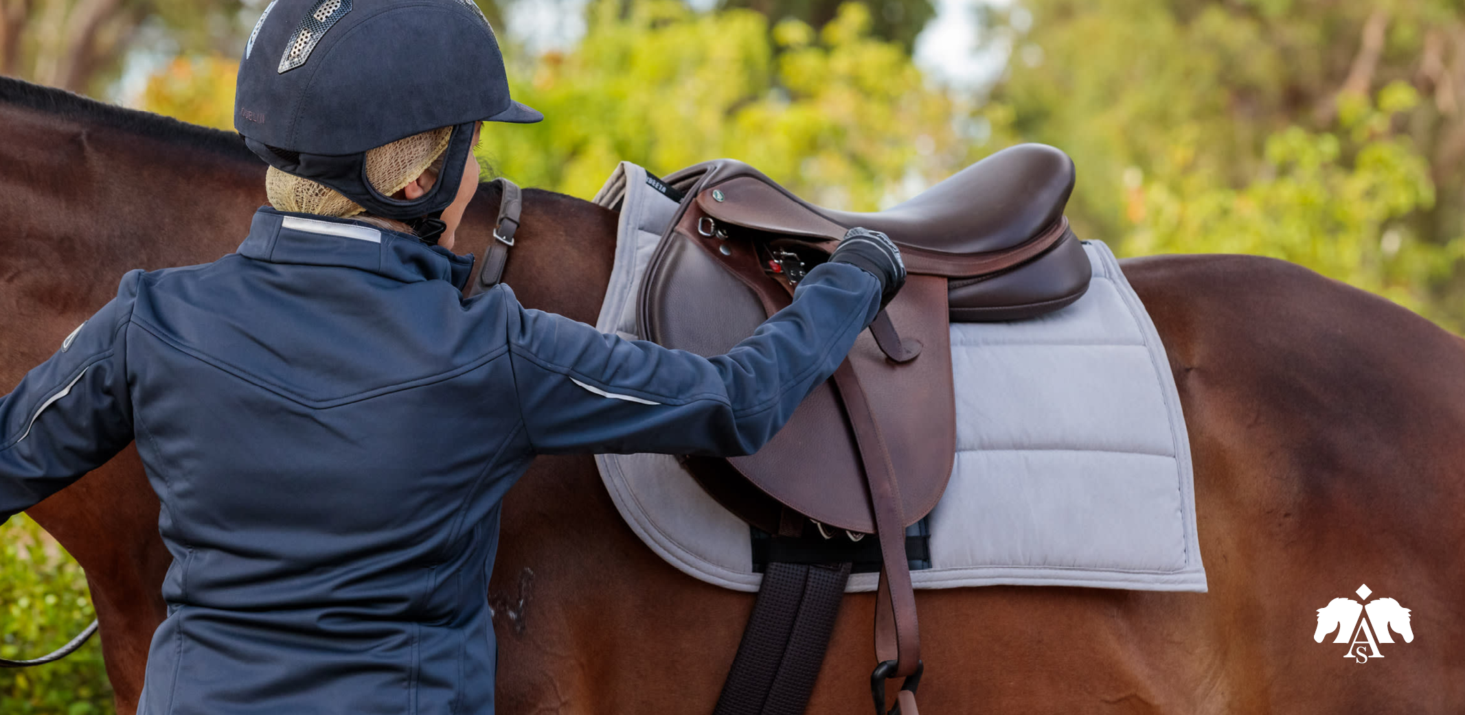 rider adjusting stirrups